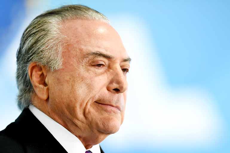 Evaristo Sá/ AFP - Presidente avisou que alterações na portaria do trabalho escravo só serão feitas após a votação, na Câmara, da segunda denúncia contra ele por obstrução de Justiça e formação de quadrilha