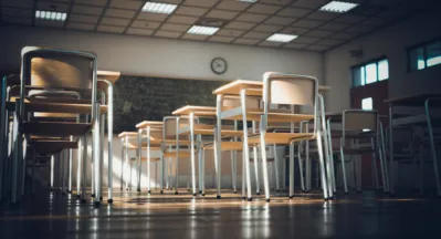 interior of a traditional primary school, wooden floor and elements, vintage and classic atmosphere. school and education concept. nobody around. 3d render.