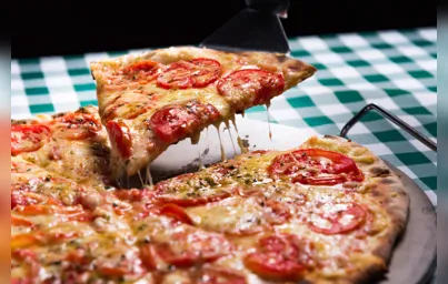 Imagem ilustrativa da imagem O Dia da Pizza vem saboroso, quentinho e bem recheado
