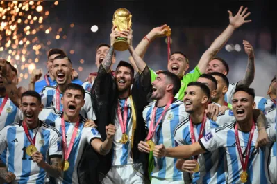 Argentina's forward #10 Lionel Messi lifts the World Cup trophy during the Qatar 2022 World Cup trophy ceremony after the football final match between Argentina and France at Lusail Stadium in Lusail, north of Doha on December 18, 2022. - Argentina won in the penalty shoot-out. (Photo by FRANCK FIFE / AFP)