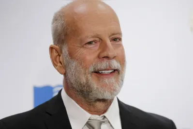 (FILES) In this file photo taken on November 15, 2017, Actor Bruce Willis arrives for the Library of Congress Gershwin Prize Honoree?s Tribute Concert in Washington, DC. - Willis, star of the "Die Hard" franchise, is to retire from acting due to an illness affecting his cognitive faculties, his family announced on March 30, 2022. A post on Instagram signed by his family said Willis had developed aphasia -- a language disorder that robs people of their ability to communicate. "Bruce has been experiencing some health issues and has recently been diagnosed with aphasia, which is impacting his cognitive abilities," read the post. (Photo by DOMINICK REUTER / AFP)