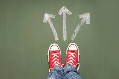 A person standing in front of three arrows showing different waysSome other related images: