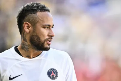 (FILES) Paris Saint-Germain’s Neymar prepares to take a corner during a friendly football match against Jeonbuk Hyundai Motors, at the Asiad Main Stadium in Busan on August 3, 2023. Brazilian striker Neymar is "probably about to leave" Paris Saint-Germain (PSG), a source close to the negotiations told AFP on August 13, 2023, referring to an offer from Saudi Arabia. (Photo by ANTHONY WALLACE / AFP)