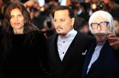 (From L) French actress director Maiwenn, US actor Johnny Depp and French actor Pierre Richard arrive for the opening ceremony and the screening of the film "Jeanne du Barry" during the 76th edition of the Cannes Film Festival in Cannes, southern France