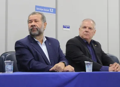 O ministro Carlos Lupi e o presidente do INSS, Alessandro Antonio Stefanutto:  o problema não é a existência da fila do INSS, mas a demora no atendimento