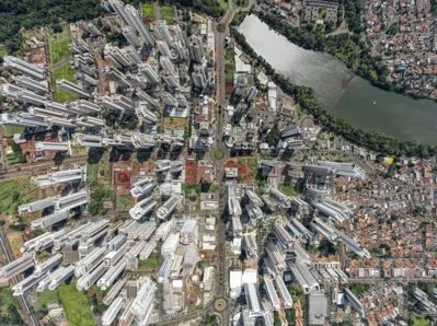 Aerial top shot of residential neighborhood with buildings in houses in the neighborhood of Gleba Palhano, Londrina - Paraná.