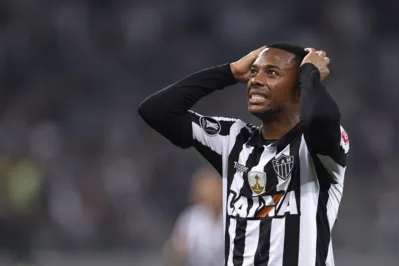 (FILES) Robinho of Brazil's Atletico Mineiro gestures during their 2017 Copa Libertadores match against Bolivia's Wilstermann held at Mineirao stadium, in Belo Horizonte, Brazil, on August 9, 2017. Brazilian justice will examine on March 20, 2024, whether former soccer player Robinho should serve his sentence for rape in Brazil, where the trial against Dani Alves sparked criticism for the silence of the cream of the football world in cases of violence against women. The magistrates of the Superior Court of Justice (STJ), based in Brasilia, will evaluate the request of the Italian justice system to homologate a nine-year prison sentence imposed on the former striker in Milan in 2017 and ultimately ratified in Rome in 2022. (Photo by DOUGLAS MAGNO / AFP)