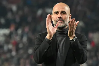 Manchester City's Spanish manager Pep Guardiola celebrates after winning the UEFA Champions League Group G day 6 group stage football match between Crvena Zvezda (Red Star Belgrade) and Manchester City at the Red Star stadium in Belgrade, on December 13, 2023. (Photo by ANDREJ ISAKOVIC / AFP)