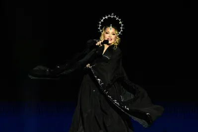 US pop star Madonna performs onstage during a free concert at Copacabana beach in Rio de Janeiro, Brazil, on May 4, 2024. . Madonna ended her “The Celebration Tour” with a performance attended by some 1.5 million enthusiastic fans. (Photo by Pablo PORCIUNCULA / AFP)