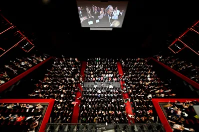 A general view shows US director Francis Ford Coppola and cast arriving for the screening of the film "Megalopolis" at the 77th edition of the Cannes Film Festival in Cannes, southern France, on May 16, 2024. (Photo by Antonin THUILLIER / AFP)