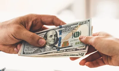 Imagem ilustrativa da imagem Dólar cai a R$ 6,09 após sessão volátil