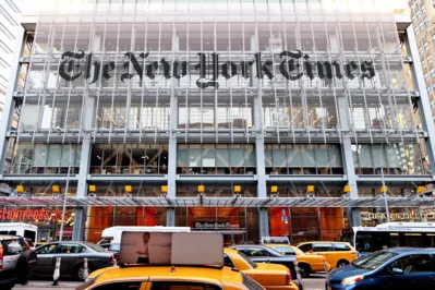 New York, USA - June 7, 2014: Facade of the New York Times headquarters building on 8th Ave. in Midtown Manhattan. The building was completed in 2007. The New York Times is an american daily newspaper that was founded in 1851.