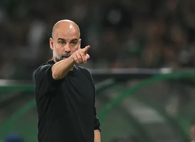Manchester City's Spanish manager Pep Guardiola reacts on the touchline during the UEFA Champions League, league phase day 4 football match between Sporting Lisbon and Manchester City at the Jose Alvalade stadium in Lisbon on November 5, 2024. (Photo by PATRICIA DE MELO MOREIRA / AFP)