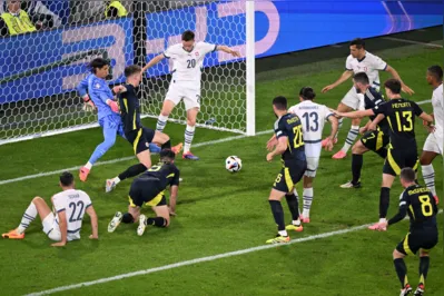 Switzerland's defence makes a save during the UEFA Euro 2024 Group A football match between Scotland and Switzerland at the Cologne Stadium in Cologne on June 19, 2024. (Photo by Kirill KUDRYAVTSEV / AFP)