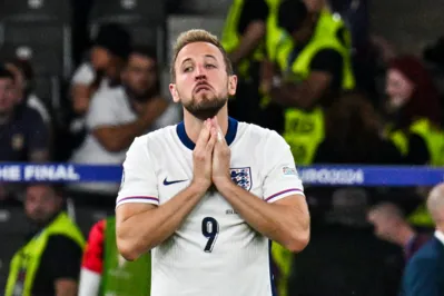 England's forward #09 Harry Kane reacts after losing the UEFA Euro 2024 final football match between Spain and England at the Olympiastadion in Berlin on July 14, 2024. (Photo by Jewel SAMAD / AFP)