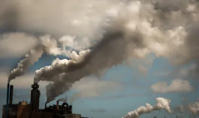 White smoke and pollution from a smoke stacks