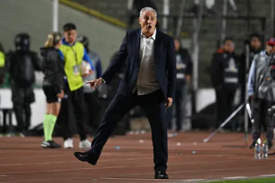 Flamengo's head coach Tite gestures during the Copa Libertadores round of 16 second leg football match between Bolivia's Bolivar and Brazil's Flamengo at the Hernando Siles stadium in La Paz on August 22, 2024. (Photo by AIZAR RALDES / AFP)