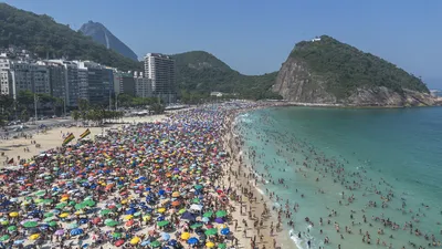 Beach on a sunny day / Praia do Leme - Rio de Janeiro - Brazil. Hot day 40 degrees Celsius