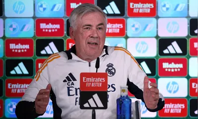 Real Madrid’s Italian coach Carlo Ancelotti gives a press conference at Real Madrid Sports City in Valdebebas ahead of their Liga football match against Mallorca, in Madrid on May 13, 2025. (Photo by Thomas COEX / AFP)