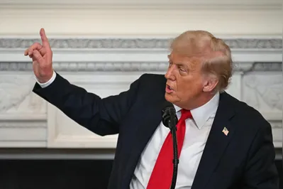 US President Donald Trump speaks during a White House Faith Office luncheon in the State Dining Room of the White House, in Washington, DC on July 14, 2025. (Photo by ANDREW CABALLERO-REYNOLDS / AFP)
