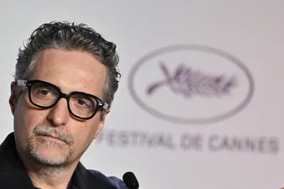 Brazilian director and screenwriter Kleber Mendonca Filho attends a press conference for the film "O Agente Secreto" (The Secret Agent) at the 78th edition of the Cannes Film Festival in Cannes, southern France, on May 19, 2025. (Photo by Xavier GALIANA / AFP)