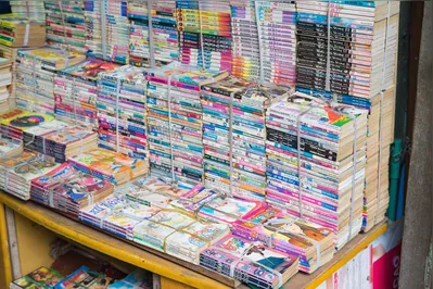 Hanoi, Vietnam - Oct 25, 2015: Used children comic for sale on Hanoi street