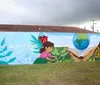 Grafite transforma muros do Litoral em painéis de arte e inclusão