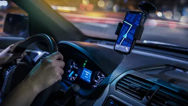 Phone based GPS in a car at night.