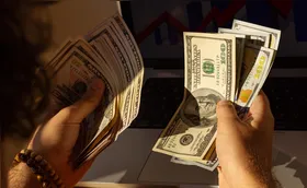 Dólar cai com alívio externo e maior apetite por risco