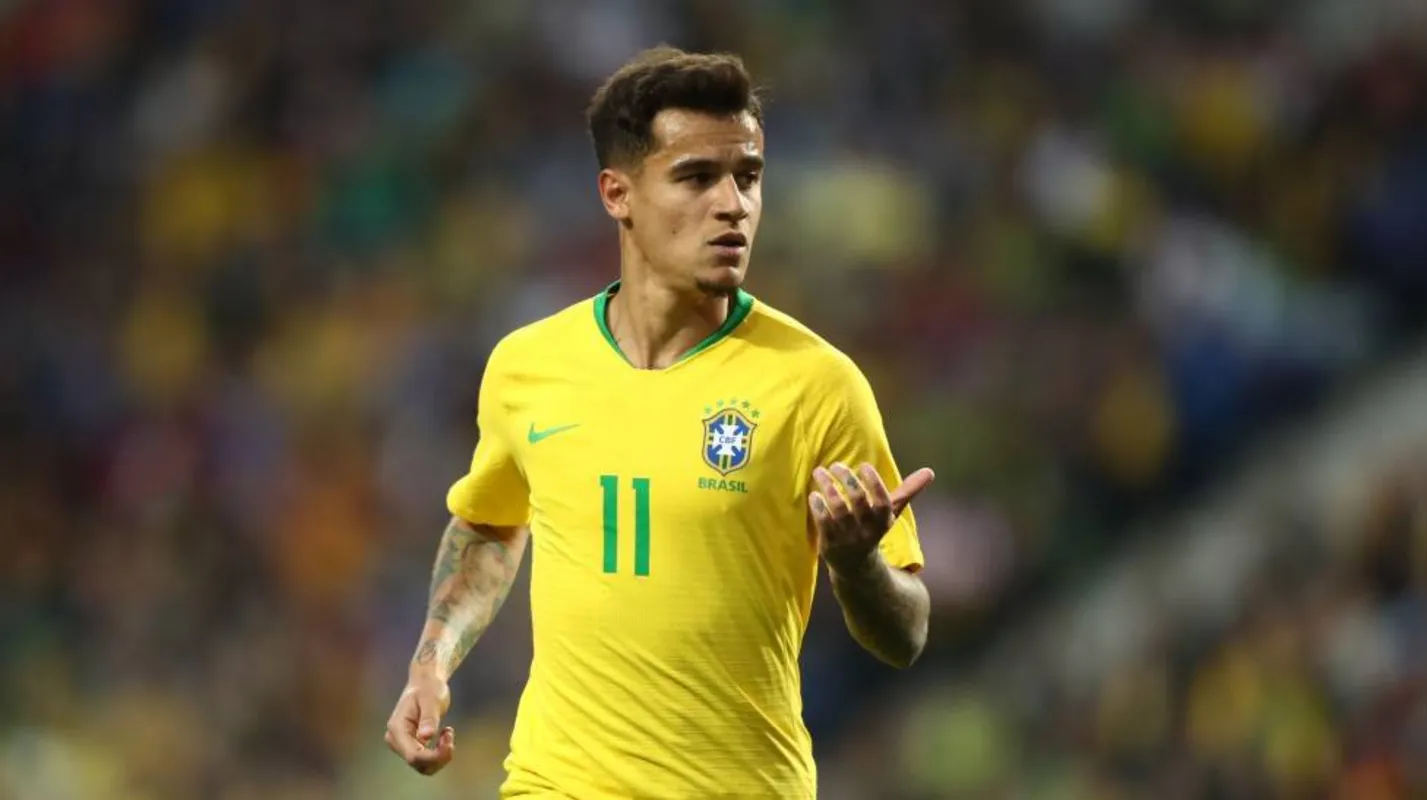 Imagem ilustrativa da imagem Tite defende Coutinho: meia 'paga o preço pelo padrão muito alto'