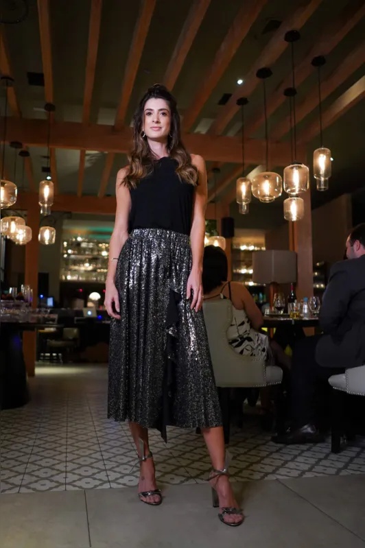 A apresentadora e influencer Paula Chiarato foi destaque no desfile