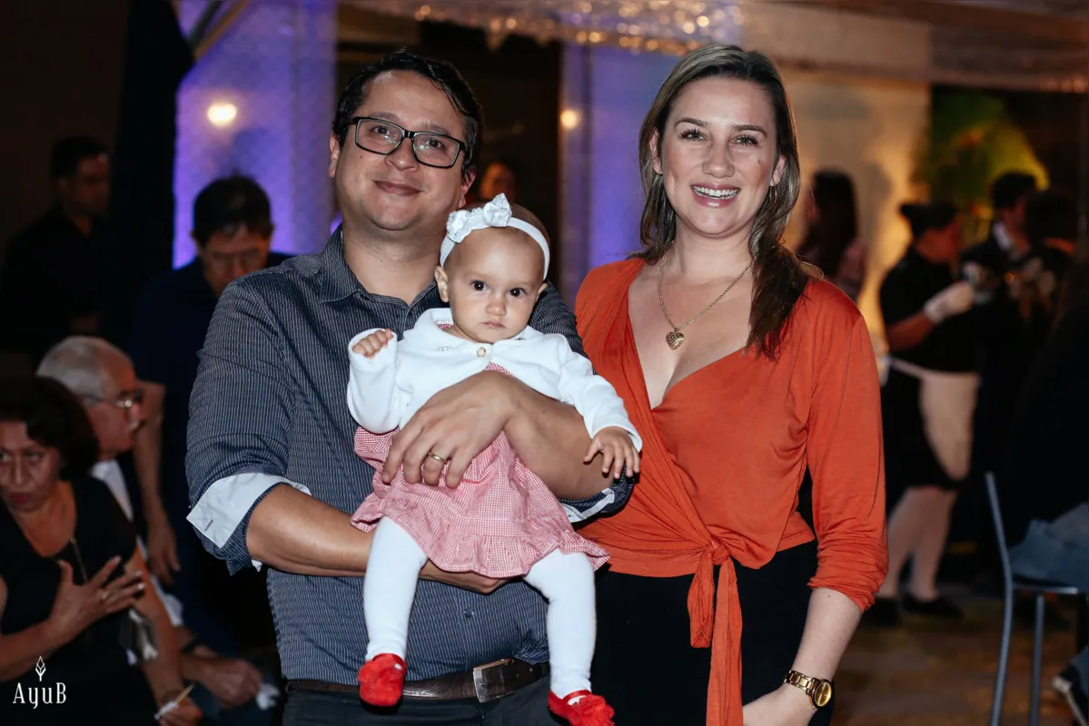 Dr. César e Heliane Fiqueiredo com a filha Heloisa 