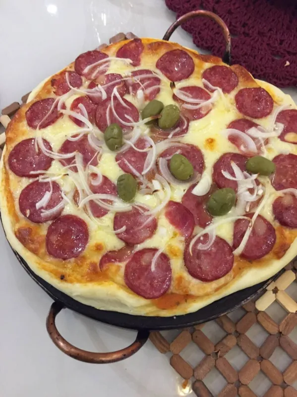 Pizza feita em casa : mais sabor com massa fina ou encorpada