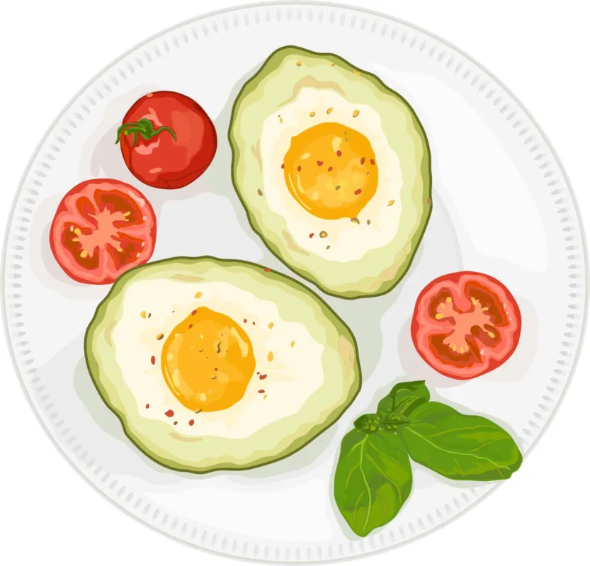 Fried eggs in baked avocado for breakfast with red tomatoes and fresh green basil.