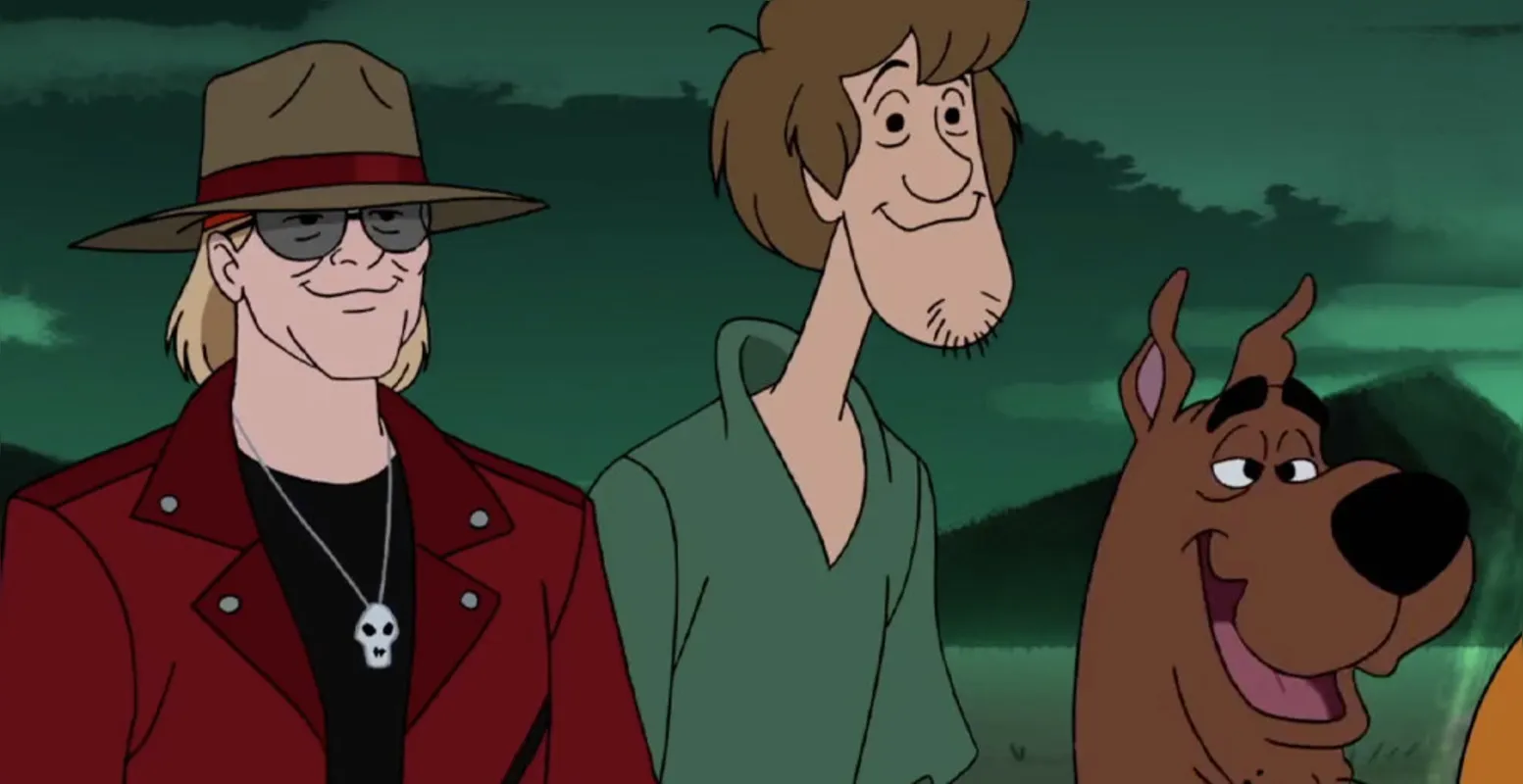 Axl Rose e os personagens do desenho no qual ele canta bem alto para destruir um asteroide que pode se chocar com a Terra