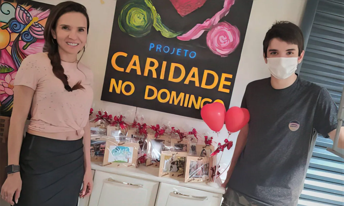 Imagem ilustrativa da imagem Mãe e filho em trabalho voluntário