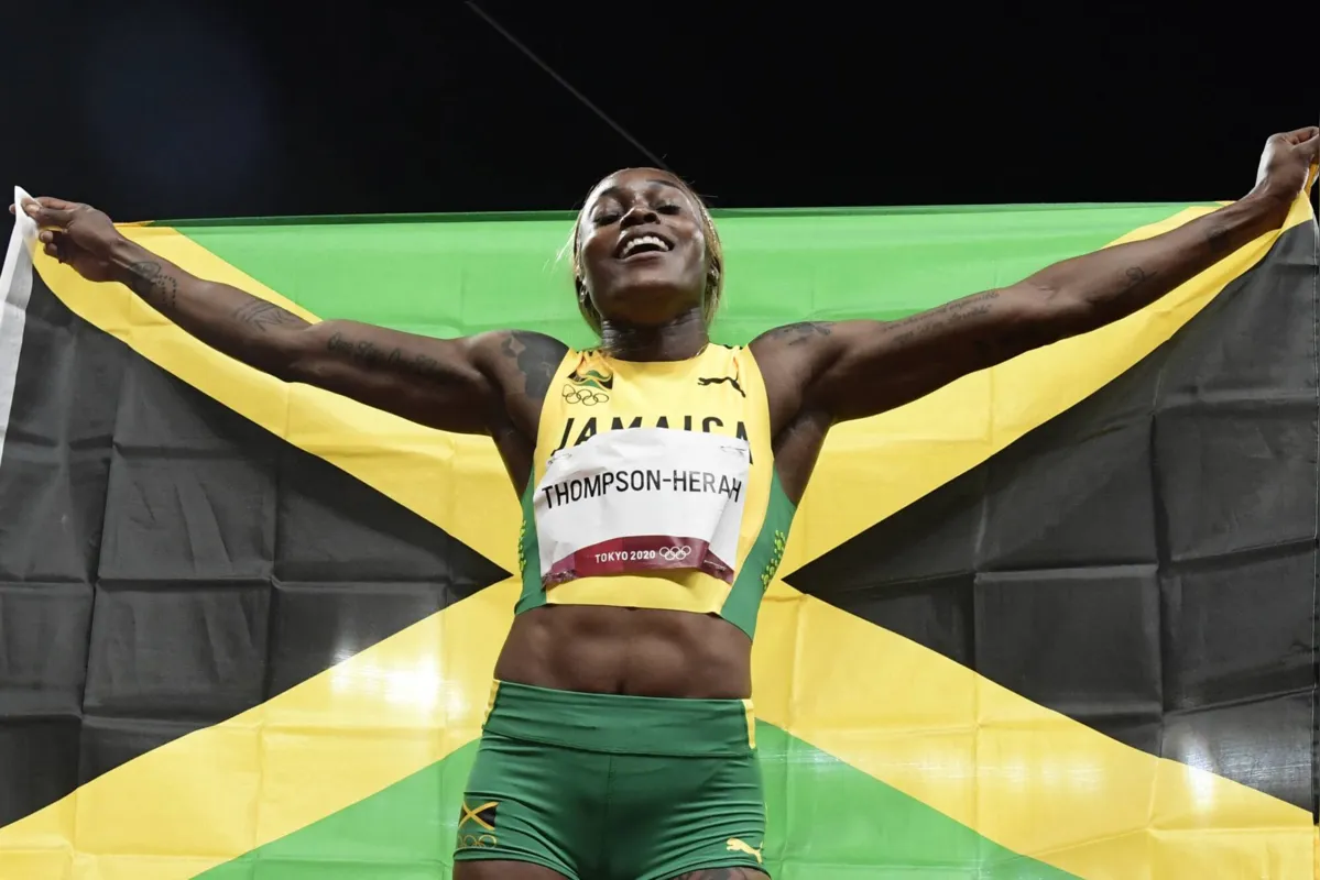 Imagem ilustrativa da imagem Elaine Thompson vence e quebra recorde olímpico dos 100 m rasos em Tóquio