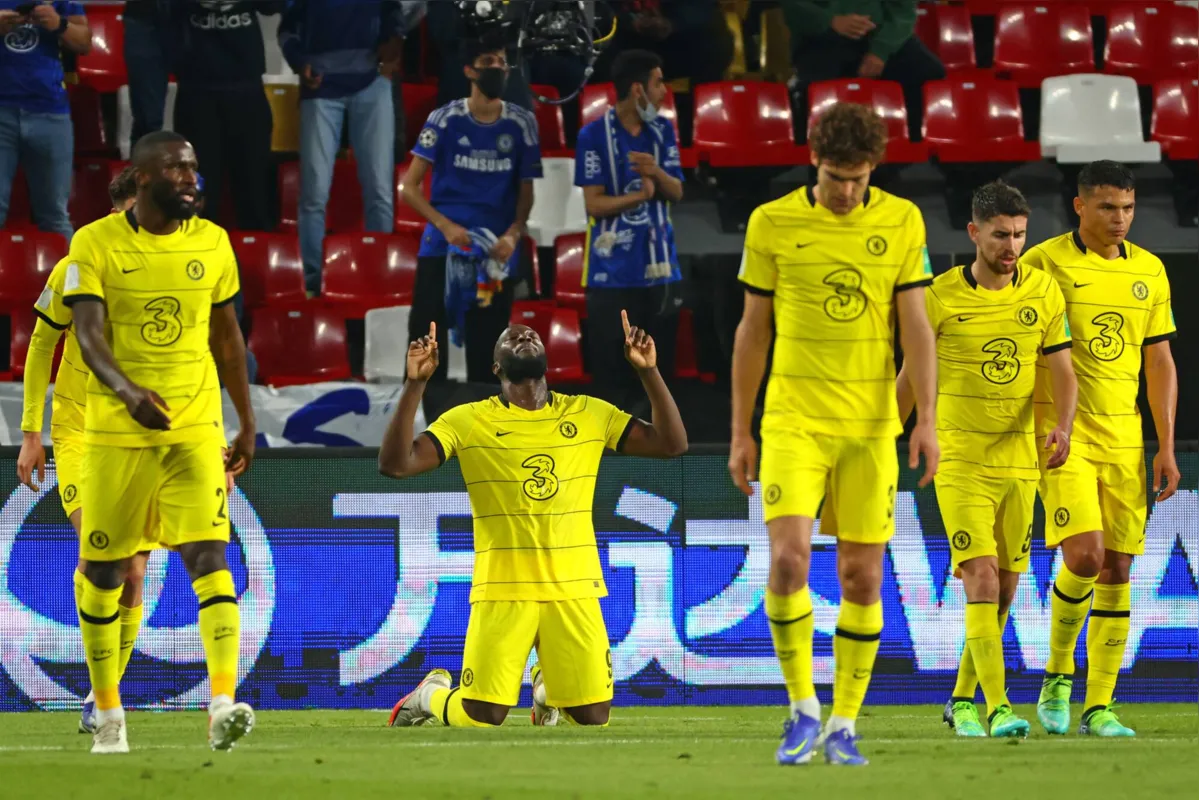 Chelsea's forward Romelu Lukaku (C) reacts after scoring the opening goal during the 2021 FIFA Club World Cup semi-final football match between Saudi's Al-Hilal and England's Chelsea at Mohammed Bin Zayed stadium in Abu Dhabi, on February 9, 2022. (Photo by Giuseppe CACACE / AFP)