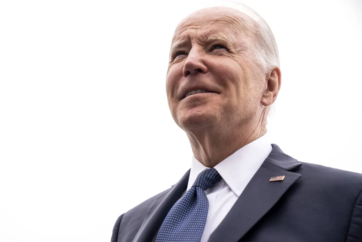 US President Joe Biden speaks to reporters after disembarking Air Force One at Joint Base Andrews in Maryland on April 25, 2022. (Photo by Stefani Reynolds / AFP)