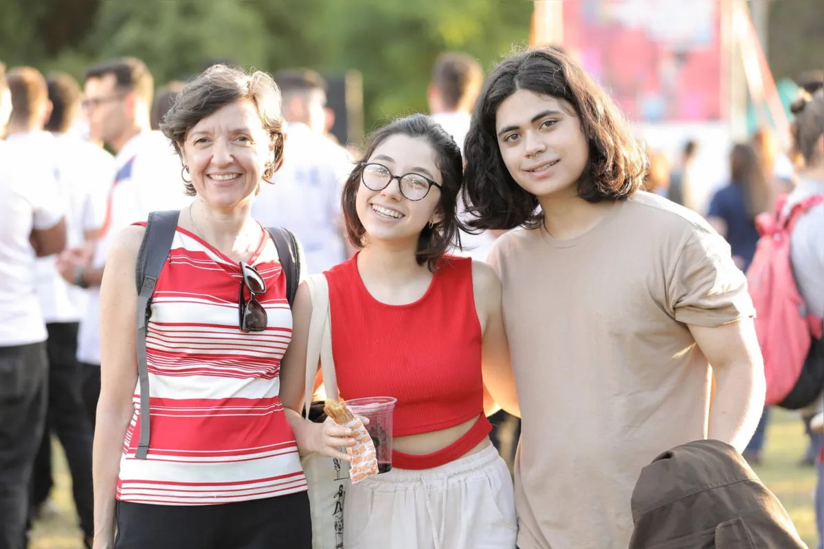 Patrícia Zanin, Marina Hara e Igor Shimoda, no aterro do Igapó