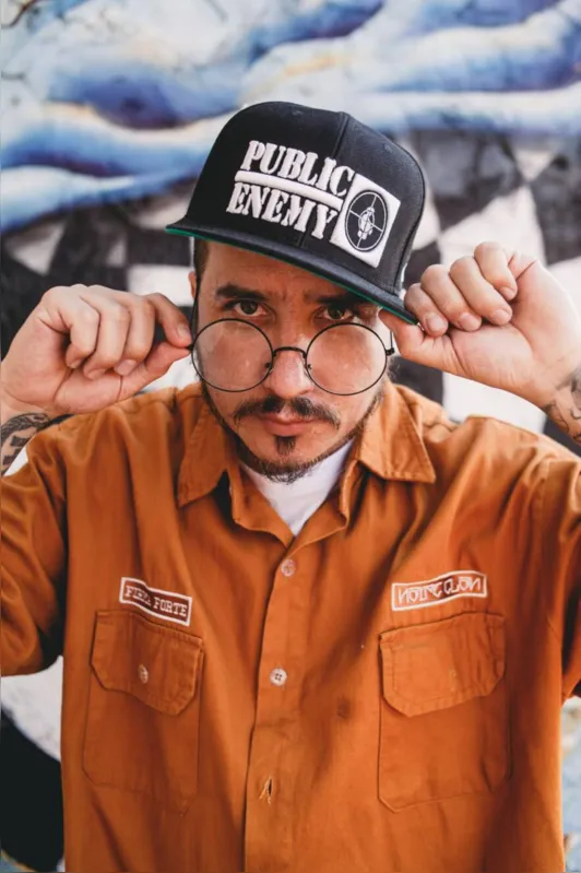 WMC,  mestre de cerimônia, organizador da Batalha da Concha, batalha pioneira da cidade.