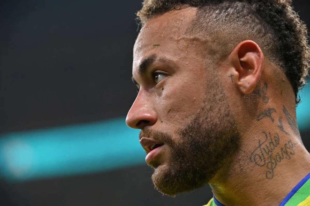 Brazil's forward #10 Neymar looks on during the Qatar 2022 World Cup Group G football match between Brazil and Serbia at the Lusail Stadium in Lusail, north of Doha on November 24, 2022. (Photo by NELSON ALMEIDA / AFP)