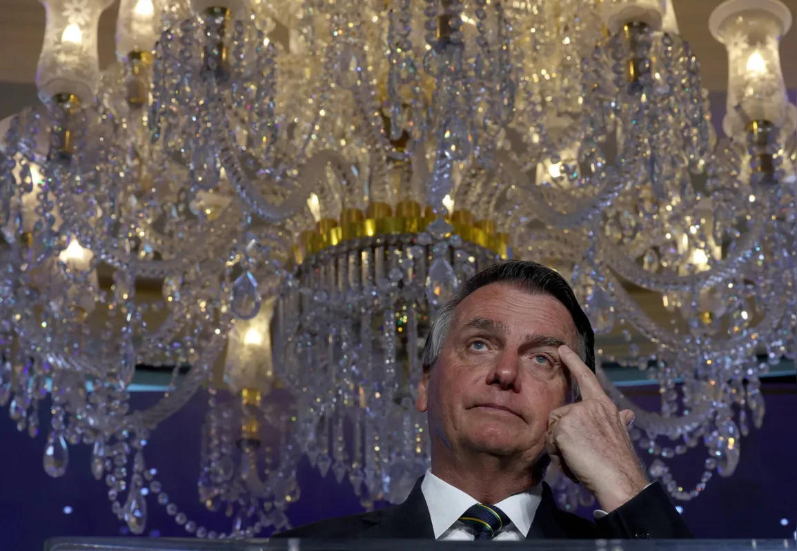 (FILES) In this file photo taken on February 3, 2023, far-right former Brazilian President Jair Bolsonaro speaks during the Turning Point USA event at the Trump National Doral Miami resort in Doral, Florida. - Lawyers for Jair Bolsonaro say the former Brazilian president has agreed to hand over to authorities jewels gifted by Saudi Arabia and which entered the country without being declared to tax authorities, local media reported on March 13, 2023. (Photo by JOE RAEDLE / GETTY IMAGES NORTH AMERICA / AFP)