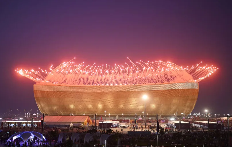Fireworks are pictured before the start of the Qatar 2022 World Cup final football match between Argentina and France at Lusail Stadium in Lusail, north of Doha on December 18, 2022. (Photo by PATRICIA DE MELO MOREIRA / AFP)