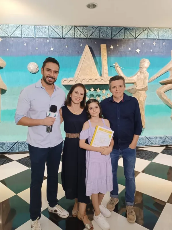 Maria Luiza com os pais, Rosana Aparecida de Santa e Marcus Alexandre Alves
