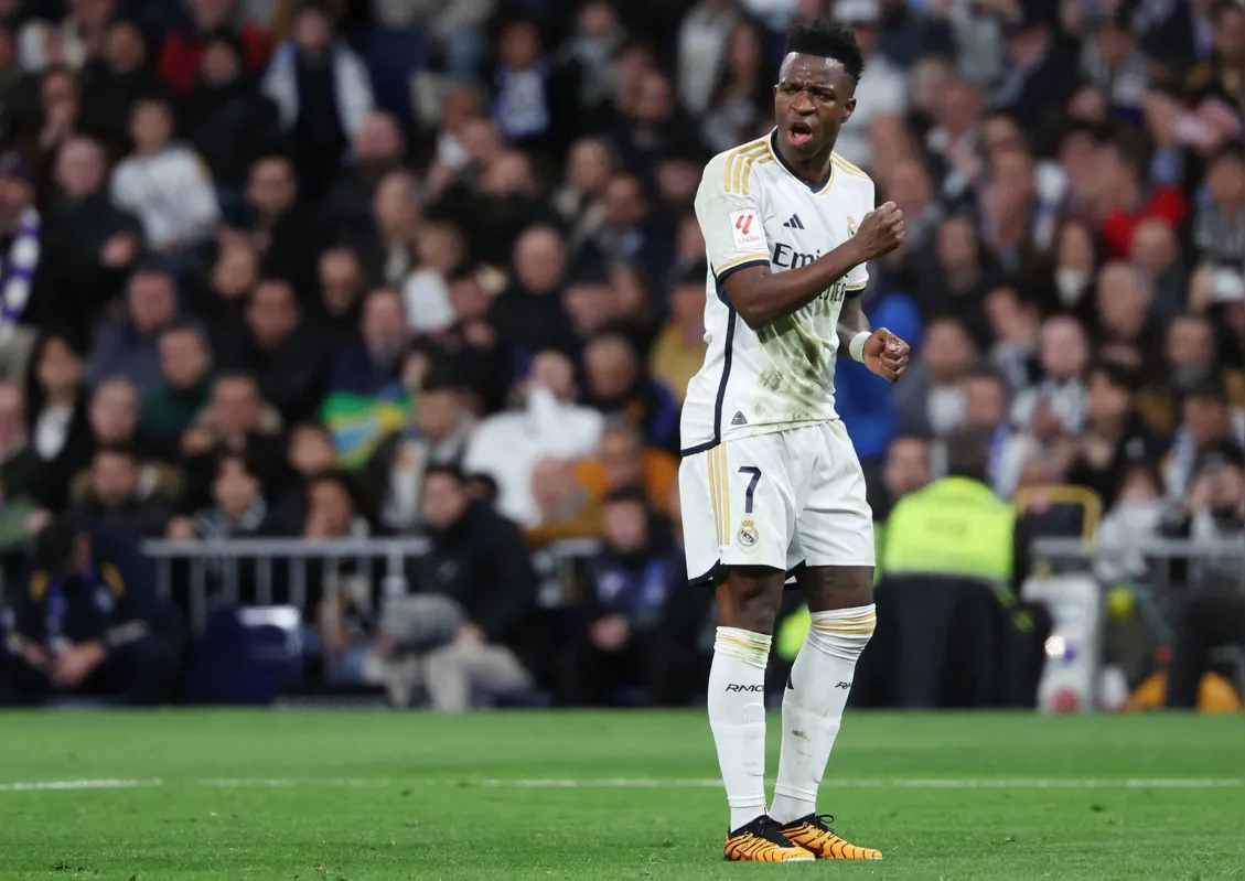 Real Madrid's Brazilian forward #07 Vinicius Junior reacts during the Spanish league football match between Real Madrid CF and RC Celta de Vigo at the Santiago Bernabeu stadium in Madrid on March 10, 2024. (Photo by Pierre-Philippe MARCOU / AFP)