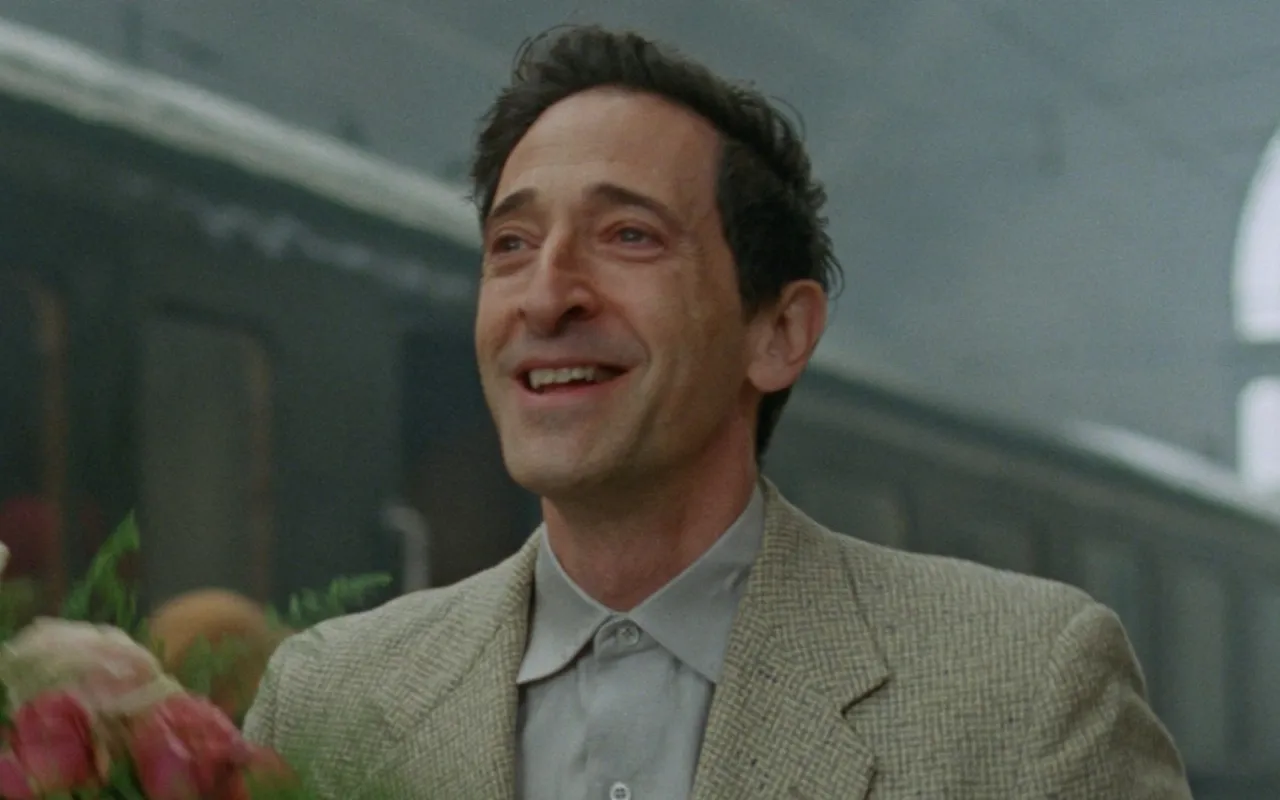 Adrien Brody em "O Brutalista": um murro na cara do sonho americano, mostrando a ilusão do "anfitrião solidário" em relação aos imirantes