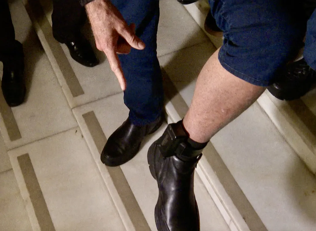 This frame grab from AFPTV video footage shows former Brazilian President Jair Bolsonaro with his ankle monitor as he leaves the National Congress in Brasilia on July 21, 2025. Bolsonaro must wear an electronic monitoring device as he awaits a verdict in his trial on charges of plotting a coup to nullify leftist President Luiz Inacio Lula da Silva's 2022 election victory. (Photo by JOS? OSORIO / AFPTV / AFP)