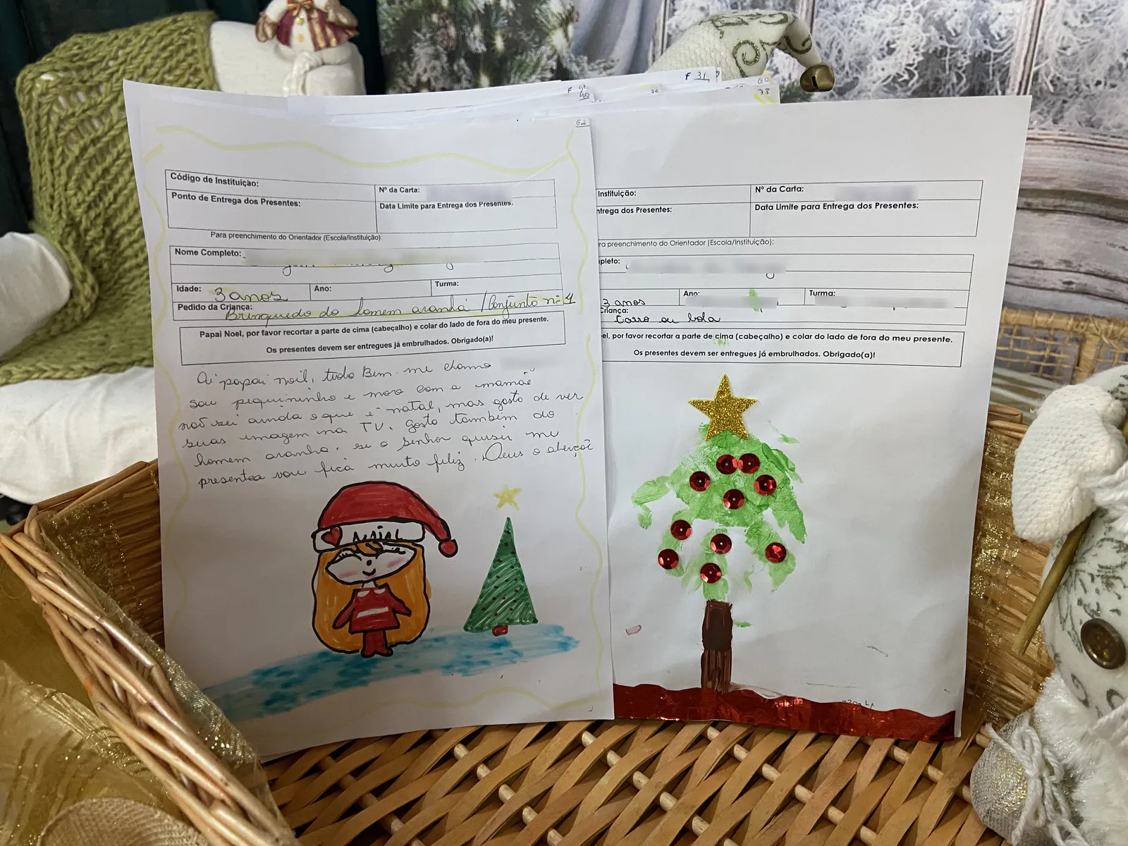 Crianças fazem desenhos temáticos em suas cartas ao Papai Noel