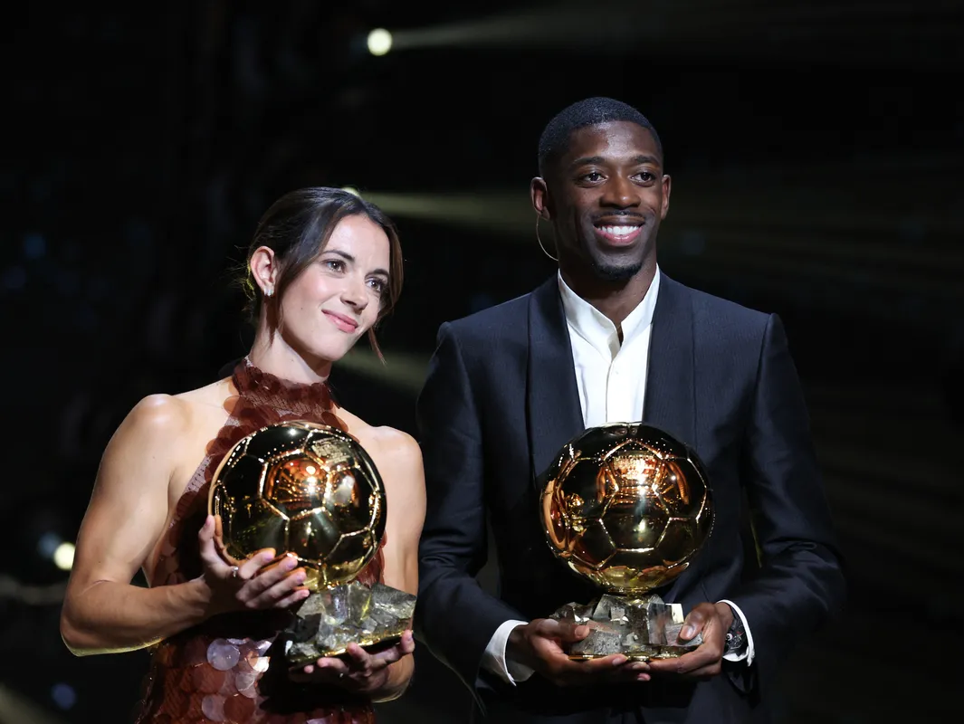 Paris Saint-Germain's French forward Ousmane Dembele and Barcelona's Spanish midfielder and Ballon d?Or 2024 winner Aitana Bonmati pose after receiving the Ballon d'Or awards during the 2025 Ballon d'Or France Football award ceremony at the Theatre du Chatelet in Paris on September 22, 2025. (Photo by Franck FIFE / AFP)